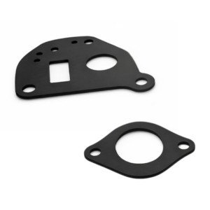 Two black die-cut rubber gaskets with bolt holes and cutouts on white background